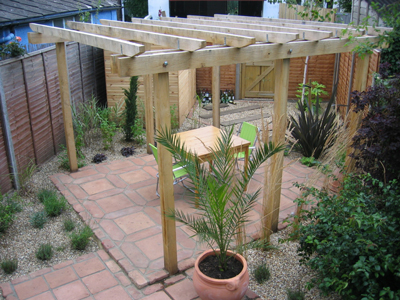 Low maintenance garden with a Mediterranean feel provides the perfect space for al fresco eating